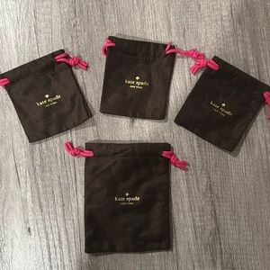 Set of 4 matching Kate Spade jewelry pouches​​​​​​​​​​